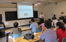 Victor Pasko, grad student coordinator presenting information to the students during grad student orientation