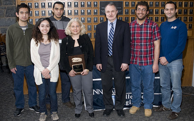 Professor Yener poses with Kultegin Aydin and some of her students