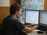 student working at a computer